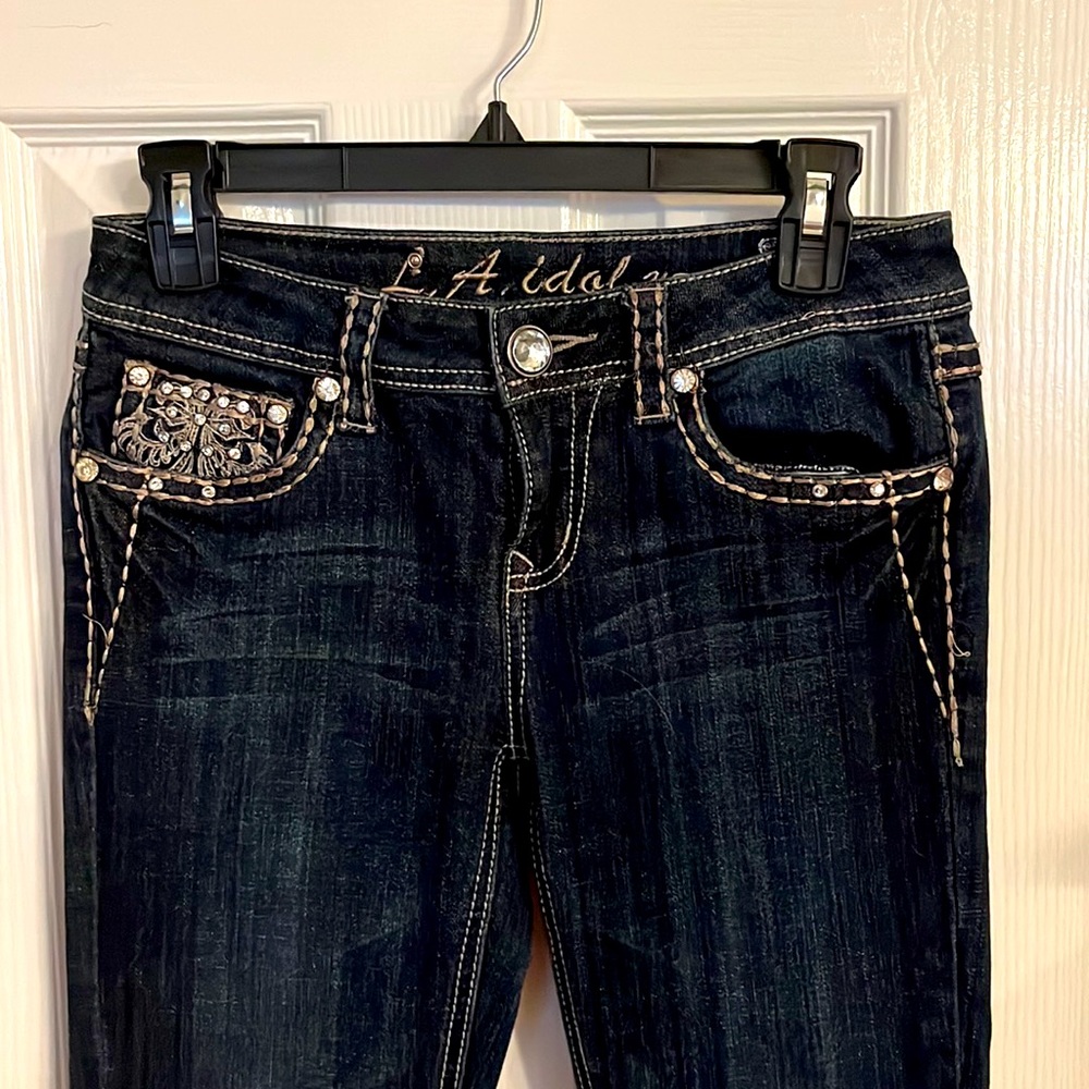 Rhinestone studded western jeans.